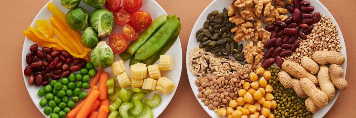 A vibrant flatlay of colorful vegetables and nuts showcasing a balanced diet concept.